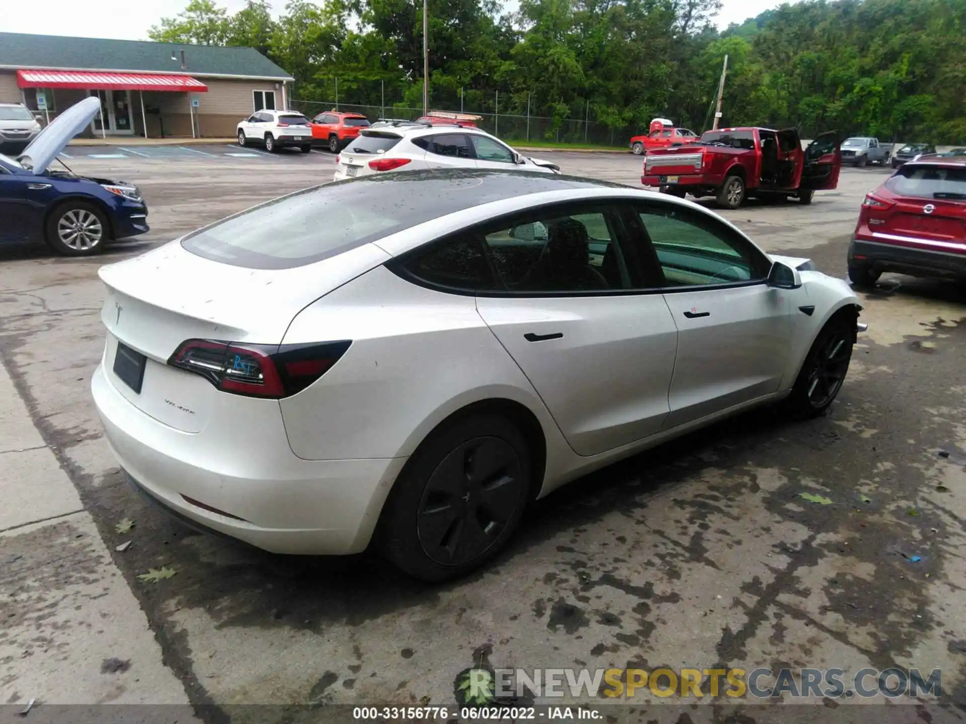 4 Photograph of a damaged car 5YJ3E1EB1MF852945 TESLA MODEL 3 2021