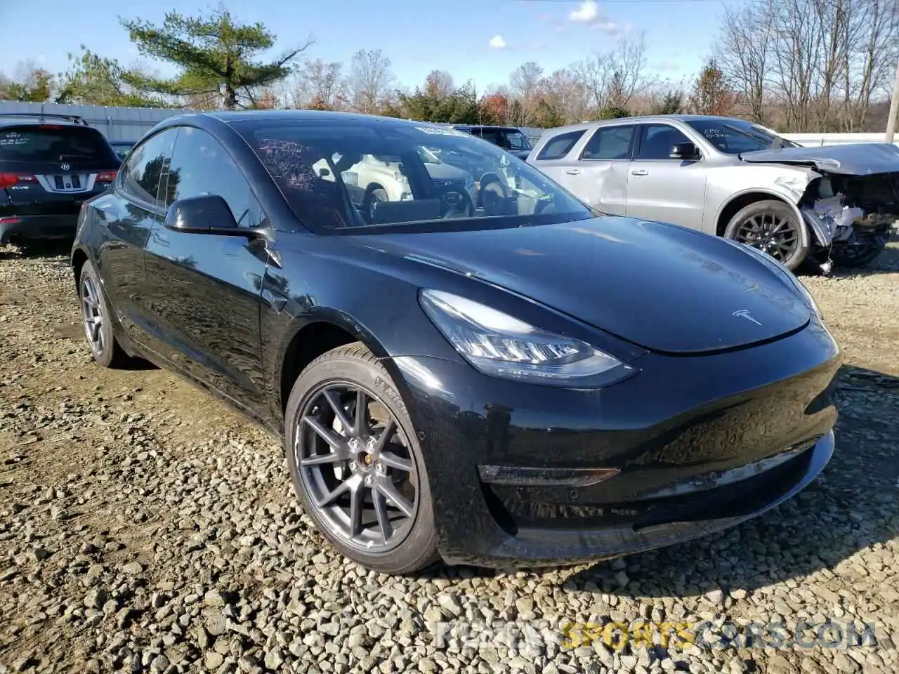 1 Photograph of a damaged car 5YJ3E1EB1MF858745 TESLA MODEL 3 2021