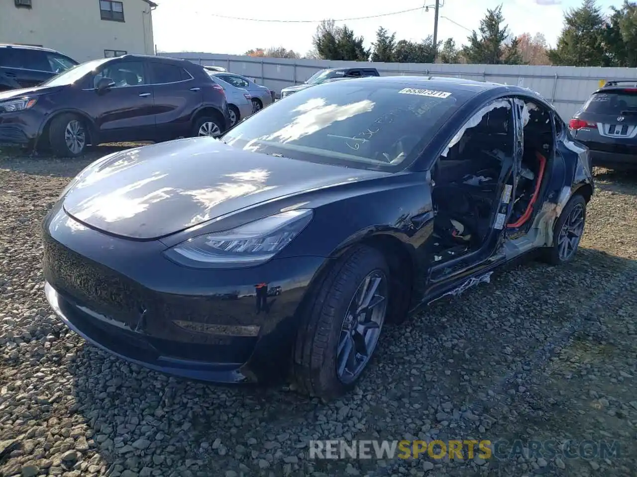 2 Photograph of a damaged car 5YJ3E1EB1MF858745 TESLA MODEL 3 2021