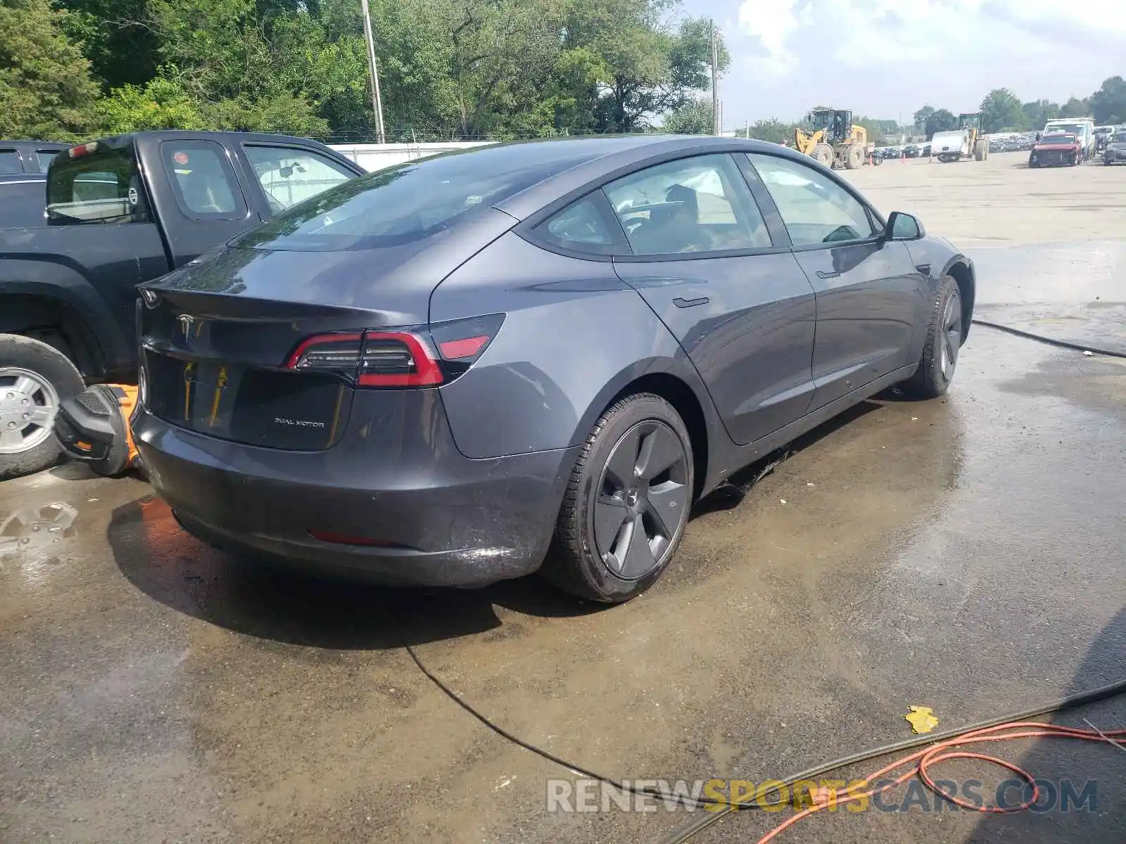 4 Photograph of a damaged car 5YJ3E1EB1MF901934 TESLA MODEL 3 2021