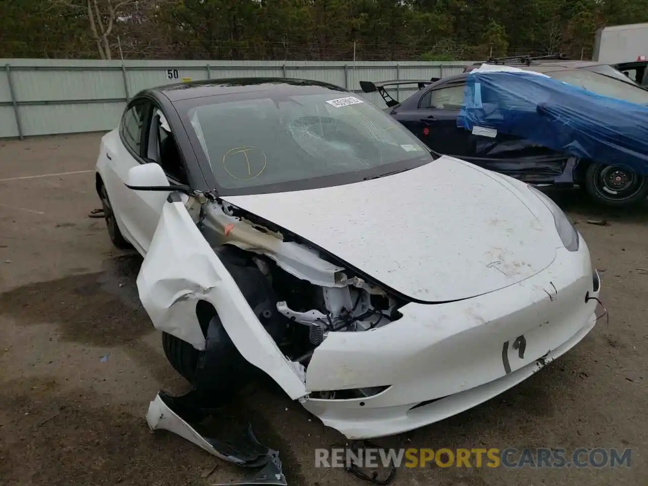 1 Photograph of a damaged car 5YJ3E1EB1MF924744 TESLA MODEL 3 2021