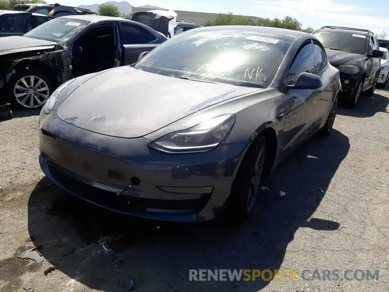 2 Photograph of a damaged car 5YJ3E1EB1MF928146 TESLA MODEL 3 2021