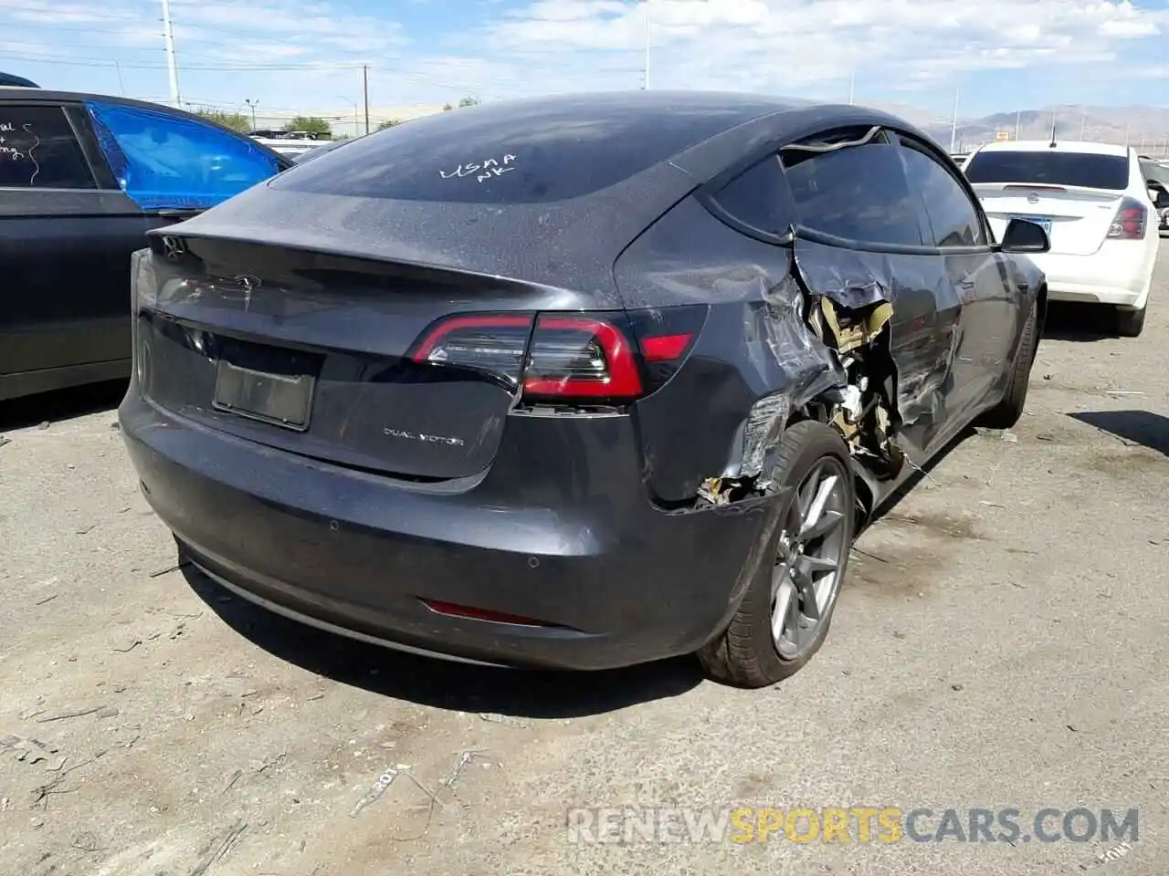 4 Photograph of a damaged car 5YJ3E1EB1MF928146 TESLA MODEL 3 2021