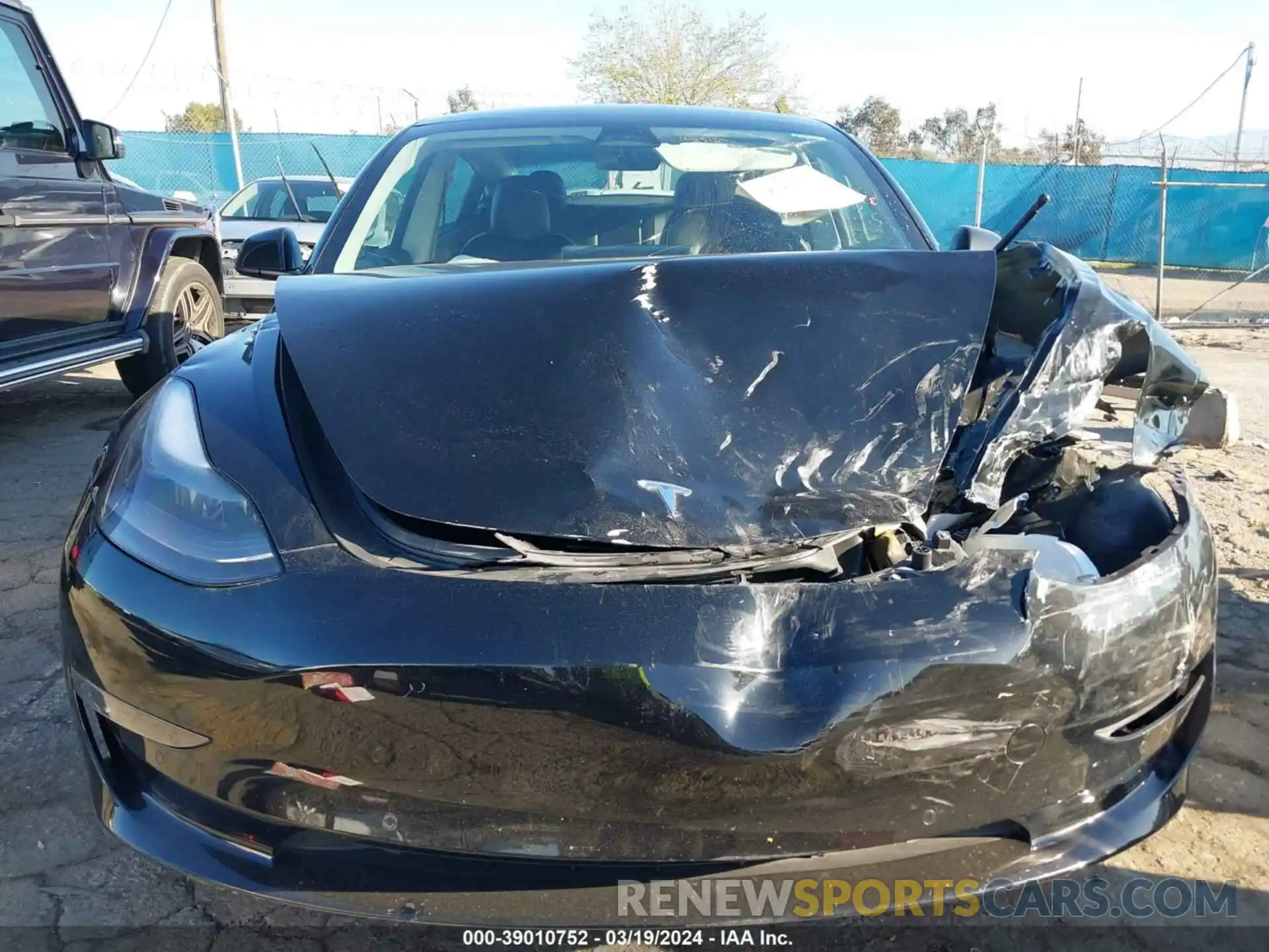 12 Photograph of a damaged car 5YJ3E1EB1MF936599 TESLA MODEL 3 2021