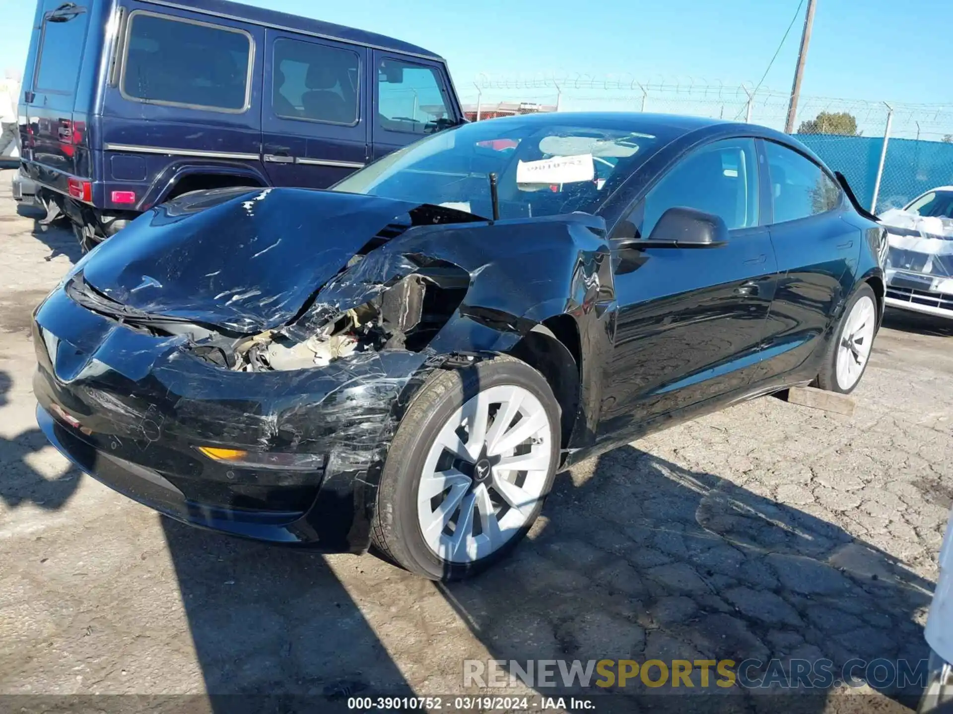 2 Photograph of a damaged car 5YJ3E1EB1MF936599 TESLA MODEL 3 2021