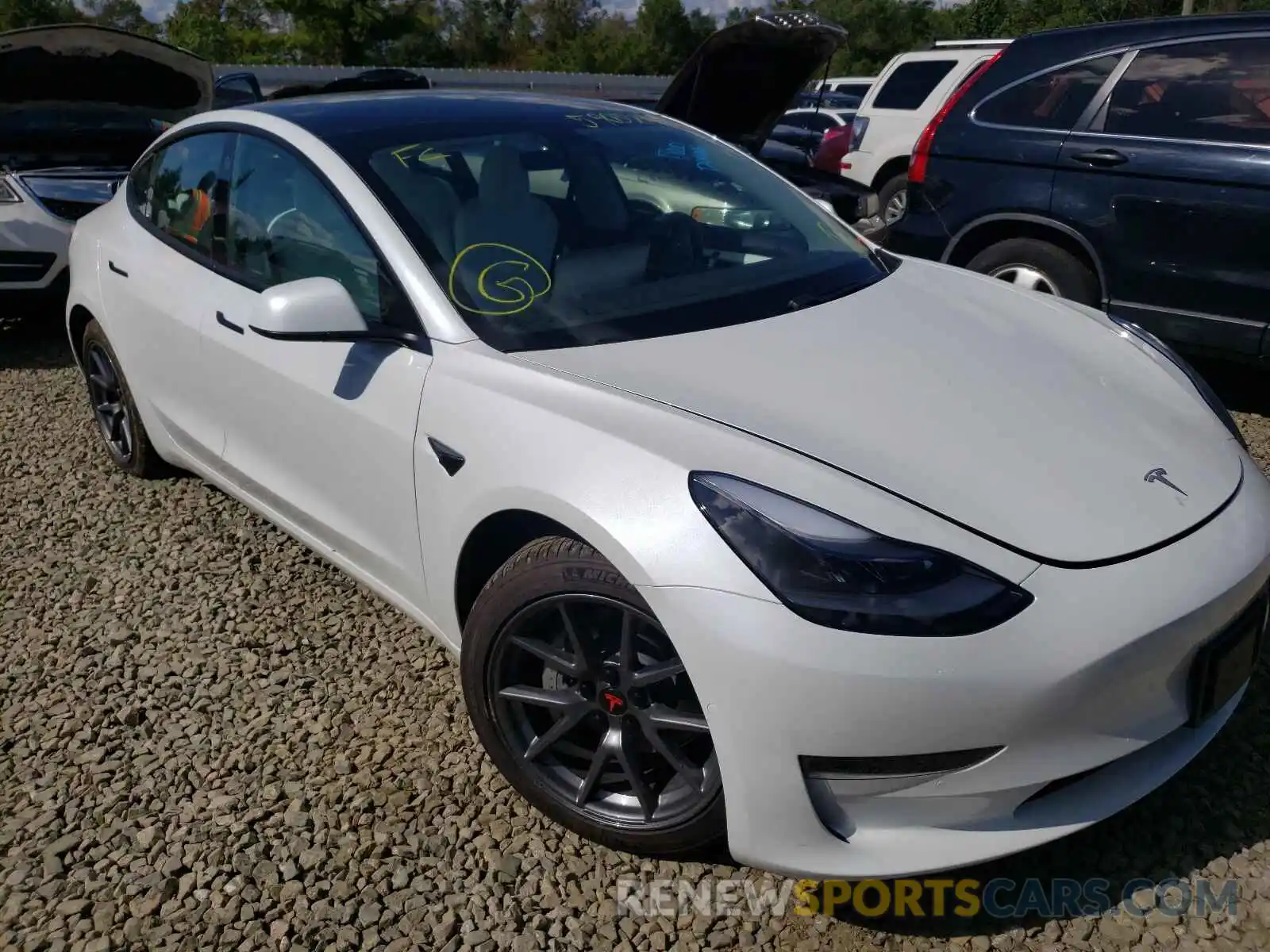 1 Photograph of a damaged car 5YJ3E1EB1MF975872 TESLA MODEL 3 2021