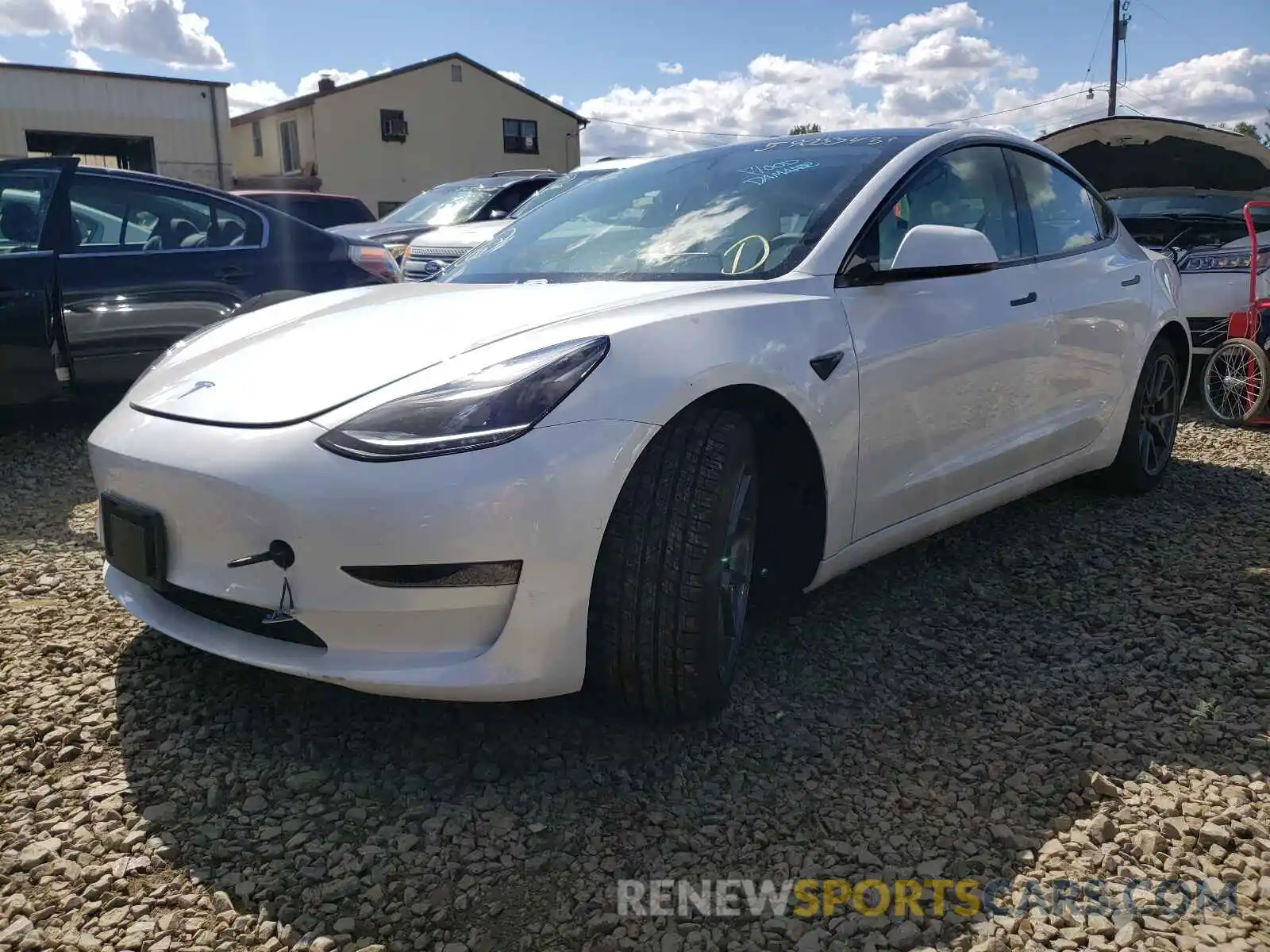 2 Photograph of a damaged car 5YJ3E1EB1MF975872 TESLA MODEL 3 2021