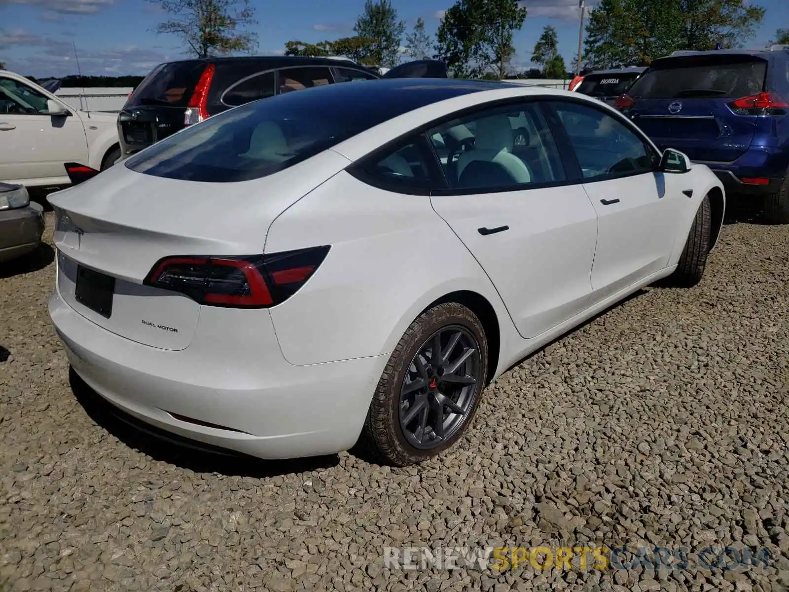 4 Фотография поврежденного автомобиля 5YJ3E1EB1MF975872 TESLA MODEL 3 2021