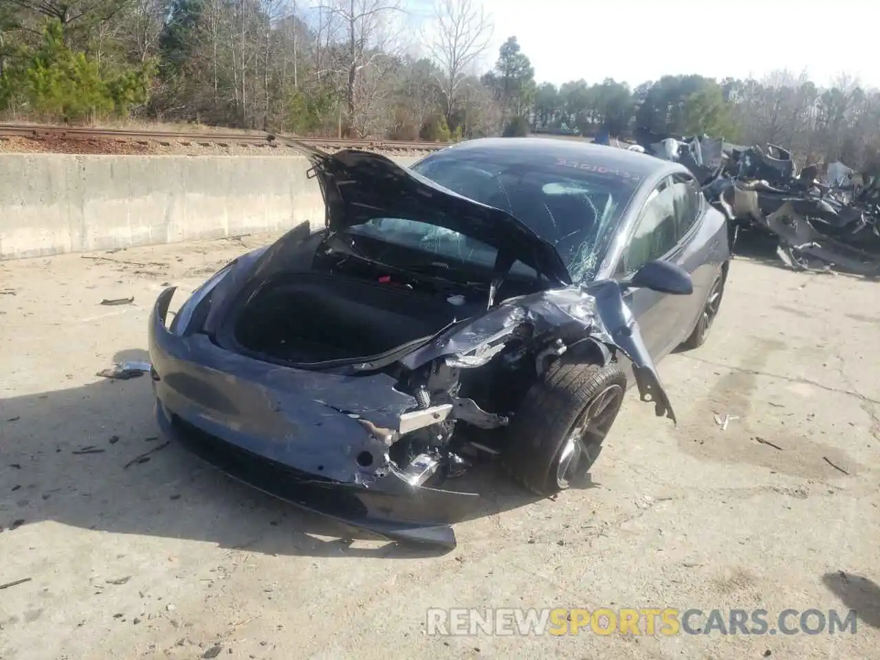 2 Photograph of a damaged car 5YJ3E1EB1MF979615 TESLA MODEL 3 2021