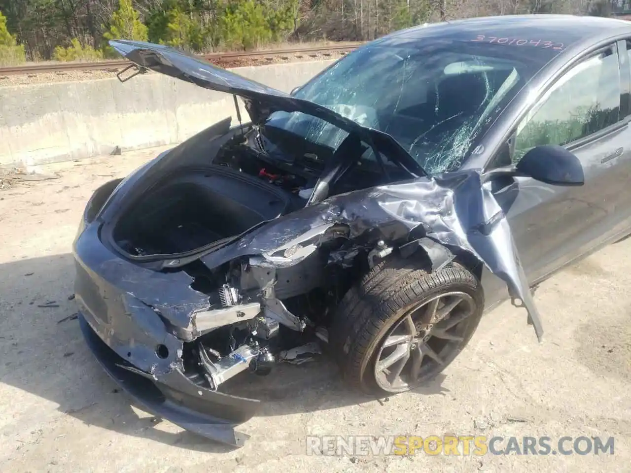 9 Photograph of a damaged car 5YJ3E1EB1MF979615 TESLA MODEL 3 2021