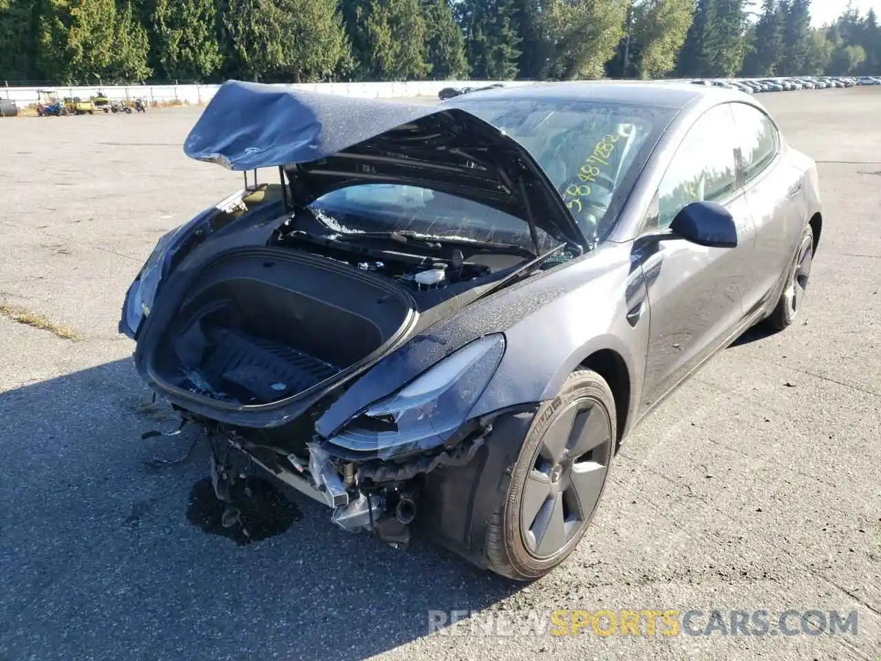 2 Photograph of a damaged car 5YJ3E1EB1MF999458 TESLA MODEL 3 2021