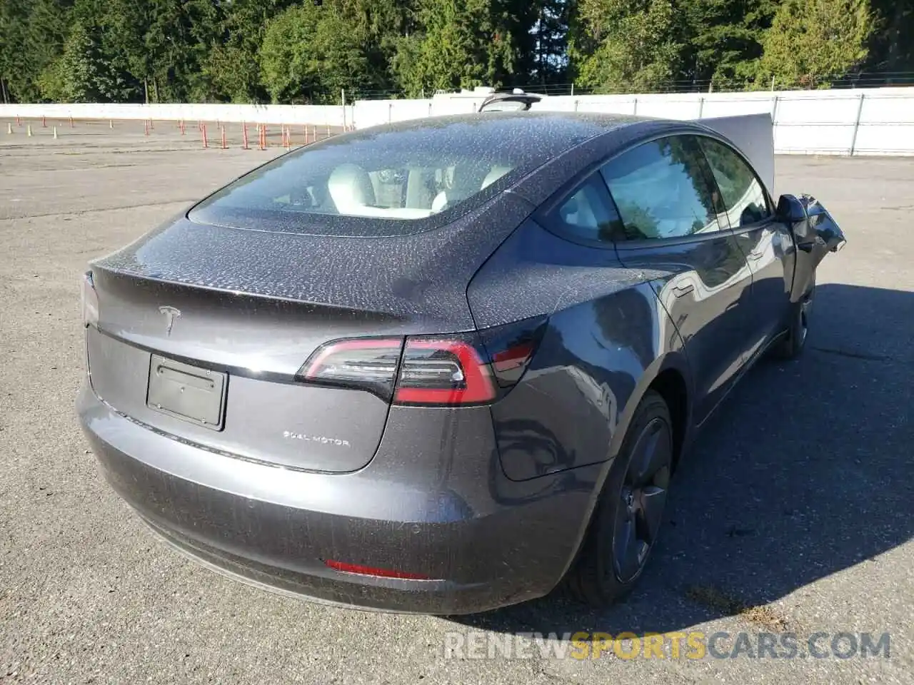 4 Photograph of a damaged car 5YJ3E1EB1MF999458 TESLA MODEL 3 2021