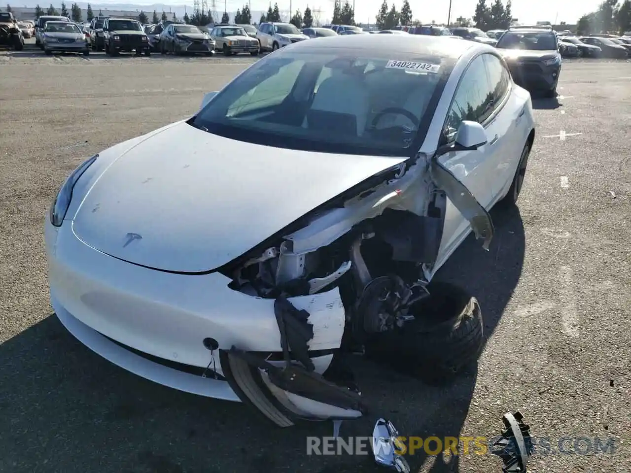 2 Photograph of a damaged car 5YJ3E1EB2MF013306 TESLA MODEL 3 2021