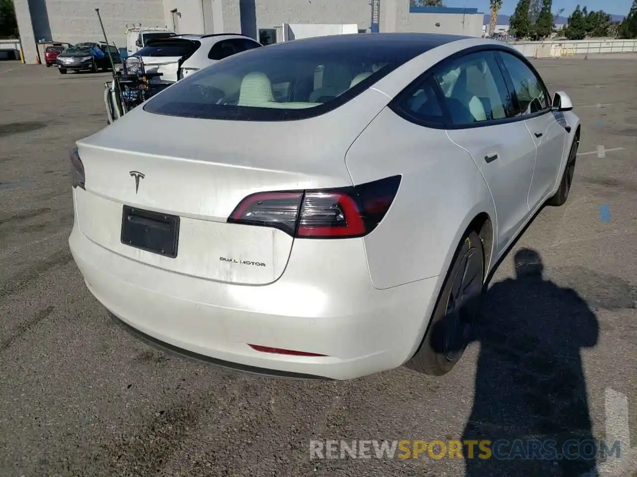 4 Photograph of a damaged car 5YJ3E1EB2MF013306 TESLA MODEL 3 2021