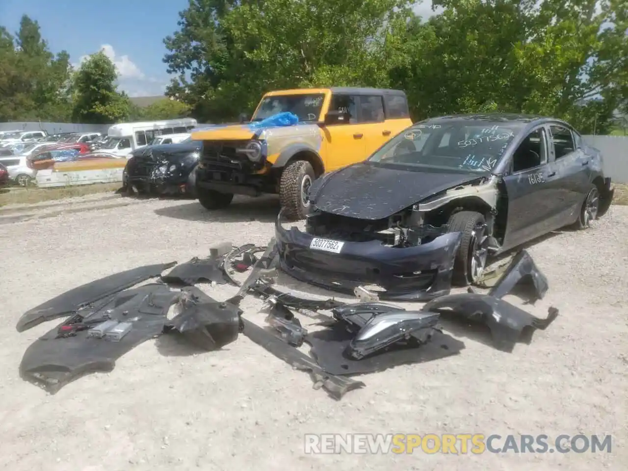 2 Photograph of a damaged car 5YJ3E1EB2MF044474 TESLA MODEL 3 2021