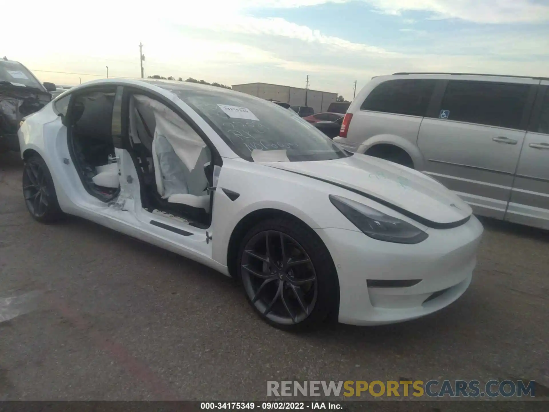 1 Photograph of a damaged car 5YJ3E1EB2MF062702 TESLA MODEL 3 2021