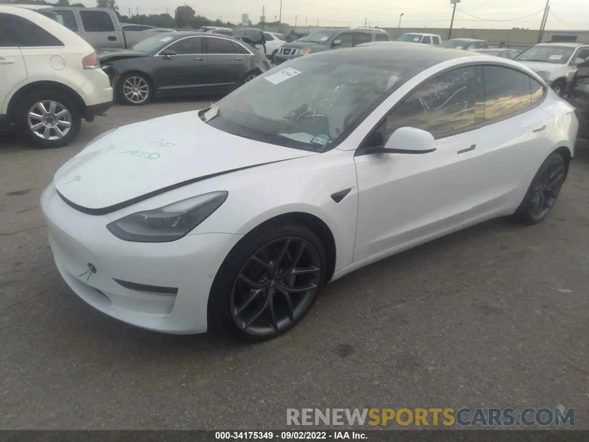 2 Photograph of a damaged car 5YJ3E1EB2MF062702 TESLA MODEL 3 2021