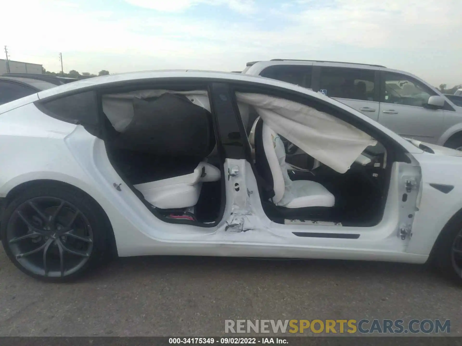 6 Photograph of a damaged car 5YJ3E1EB2MF062702 TESLA MODEL 3 2021