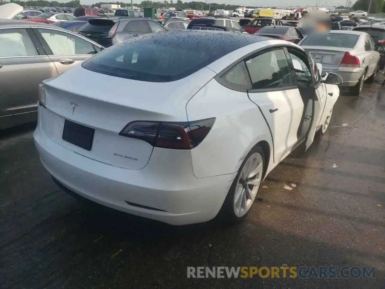 4 Photograph of a damaged car 5YJ3E1EB2MF101076 TESLA MODEL 3 2021