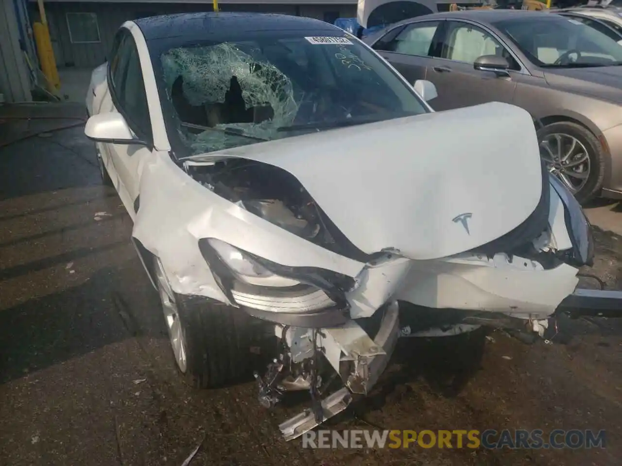 9 Photograph of a damaged car 5YJ3E1EB2MF101076 TESLA MODEL 3 2021