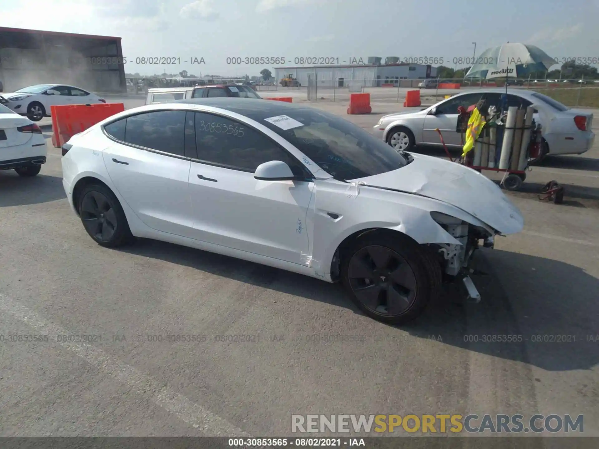 1 Photograph of a damaged car 5YJ3E1EB2MF837015 TESLA MODEL 3 2021