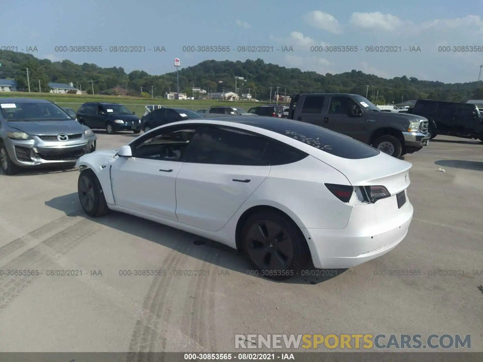 3 Photograph of a damaged car 5YJ3E1EB2MF837015 TESLA MODEL 3 2021