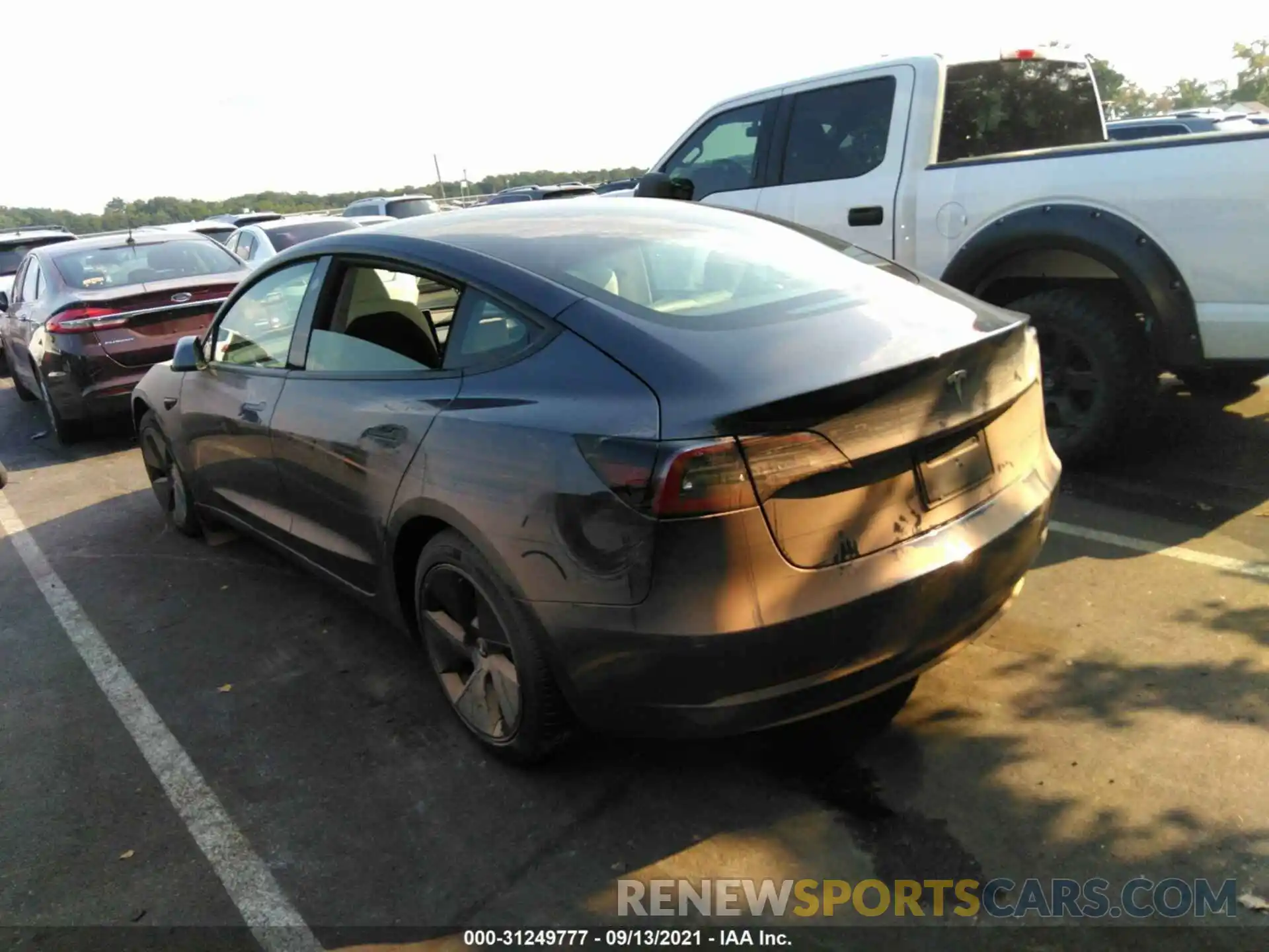 3 Photograph of a damaged car 5YJ3E1EB2MF852646 TESLA MODEL 3 2021