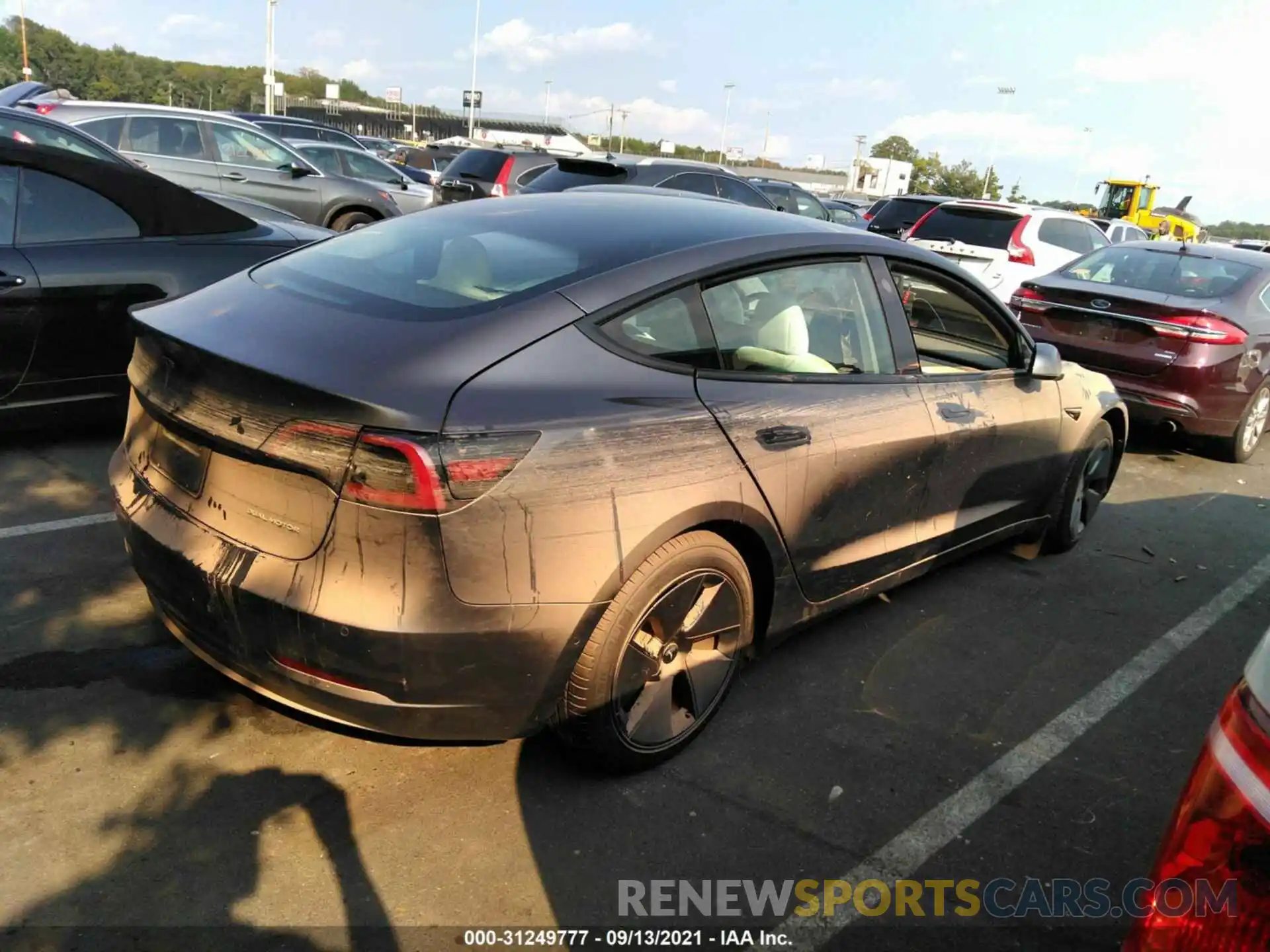 4 Photograph of a damaged car 5YJ3E1EB2MF852646 TESLA MODEL 3 2021