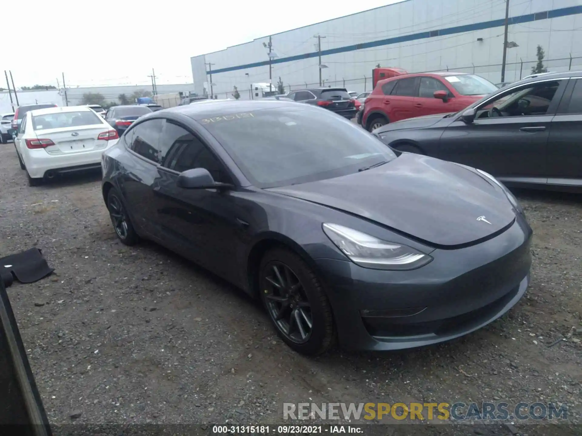 1 Photograph of a damaged car 5YJ3E1EB2MF858026 TESLA MODEL 3 2021