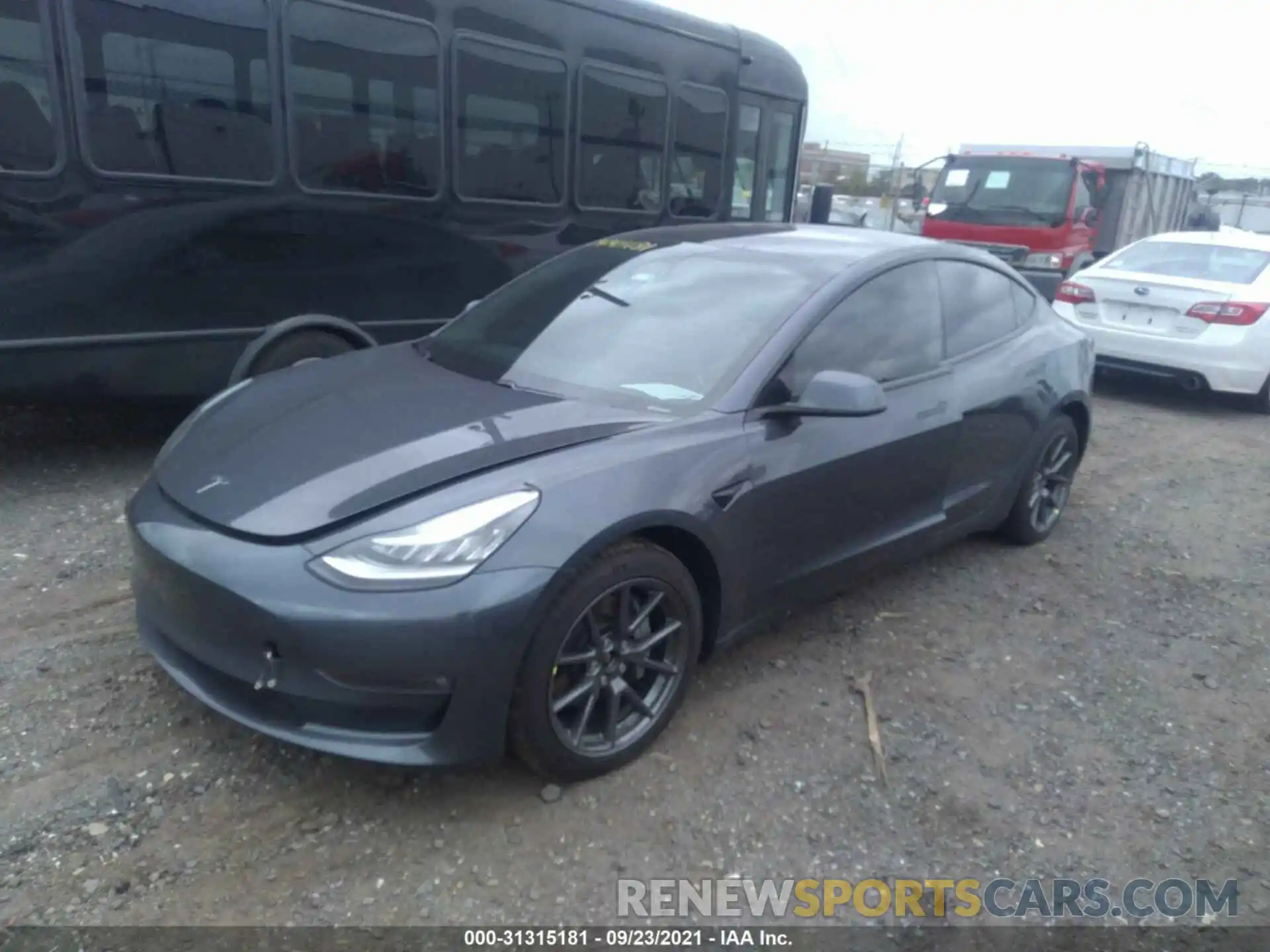 2 Photograph of a damaged car 5YJ3E1EB2MF858026 TESLA MODEL 3 2021