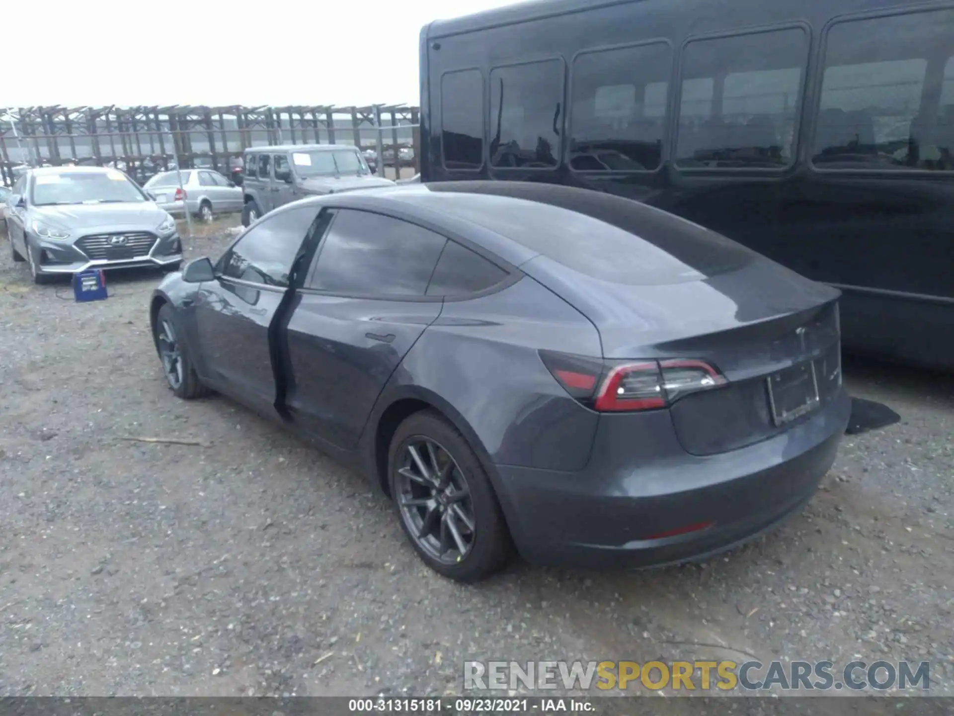 3 Photograph of a damaged car 5YJ3E1EB2MF858026 TESLA MODEL 3 2021