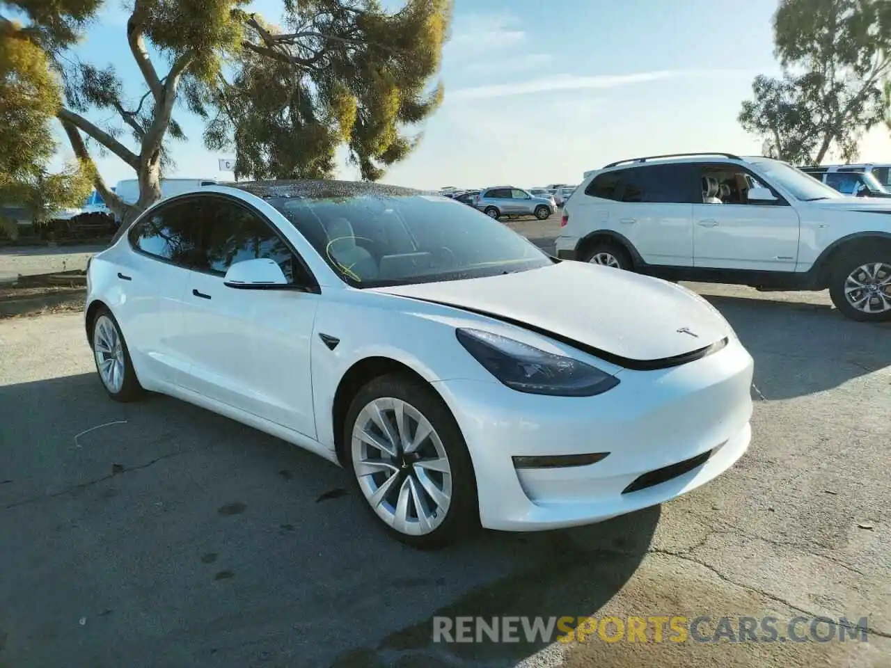 1 Photograph of a damaged car 5YJ3E1EB2MF877563 TESLA MODEL 3 2021