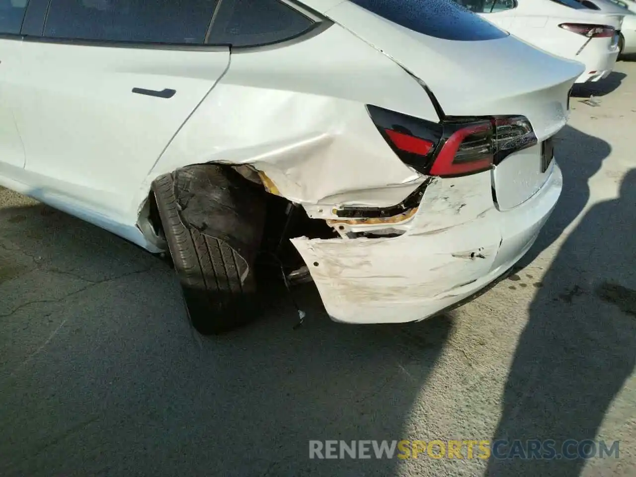 9 Photograph of a damaged car 5YJ3E1EB2MF877563 TESLA MODEL 3 2021