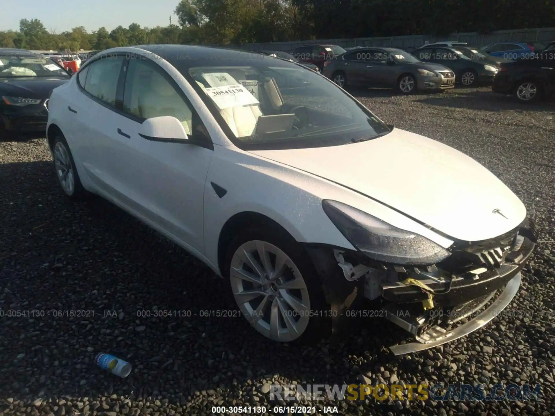 1 Photograph of a damaged car 5YJ3E1EB2MF903451 TESLA MODEL 3 2021