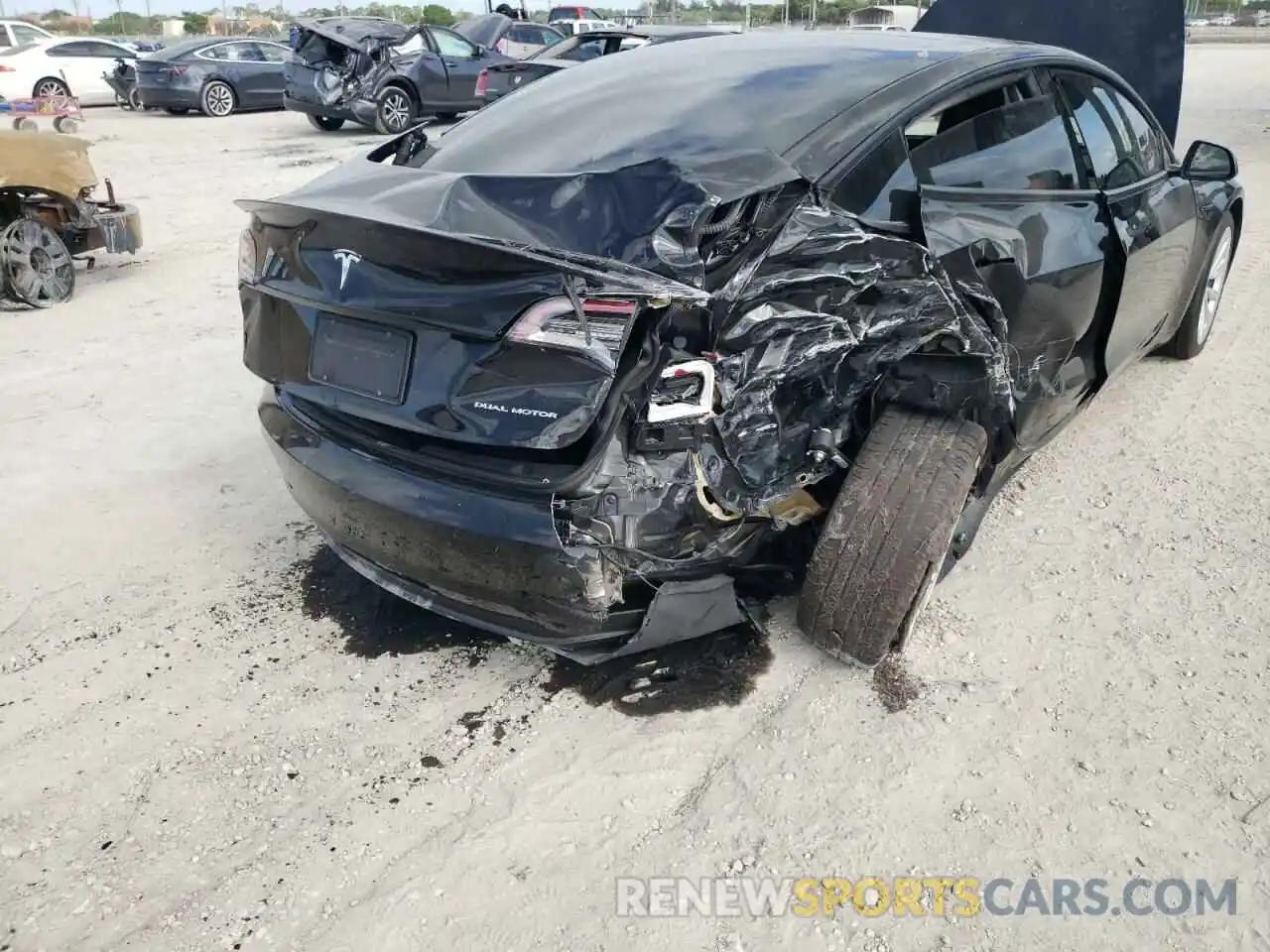 9 Photograph of a damaged car 5YJ3E1EB2MF919049 TESLA MODEL 3 2021