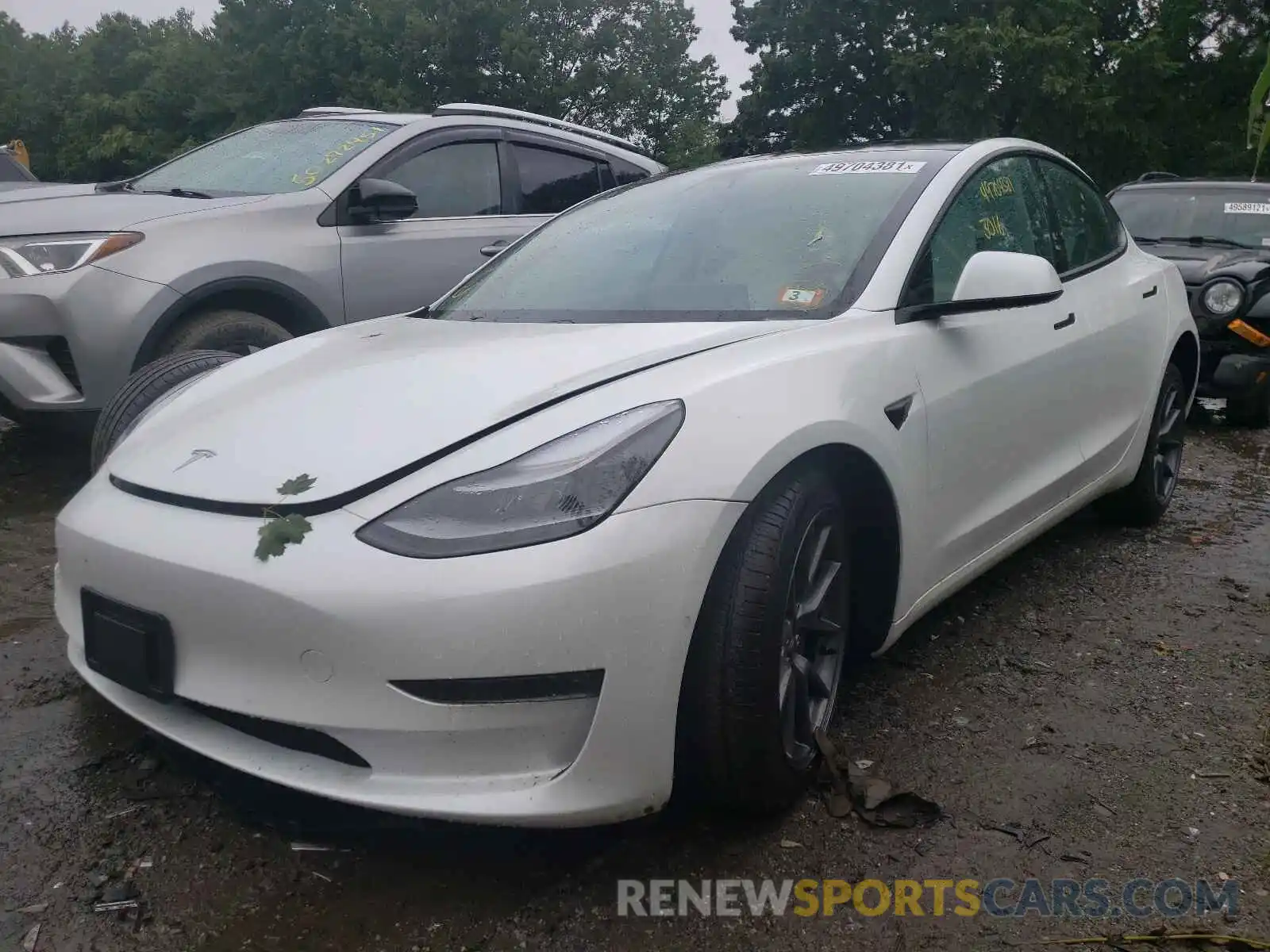 2 Photograph of a damaged car 5YJ3E1EB2MF925207 TESLA MODEL 3 2021