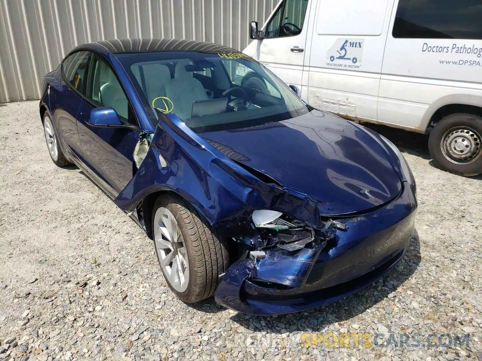 1 Photograph of a damaged car 5YJ3E1EB2MF926602 TESLA MODEL 3 2021