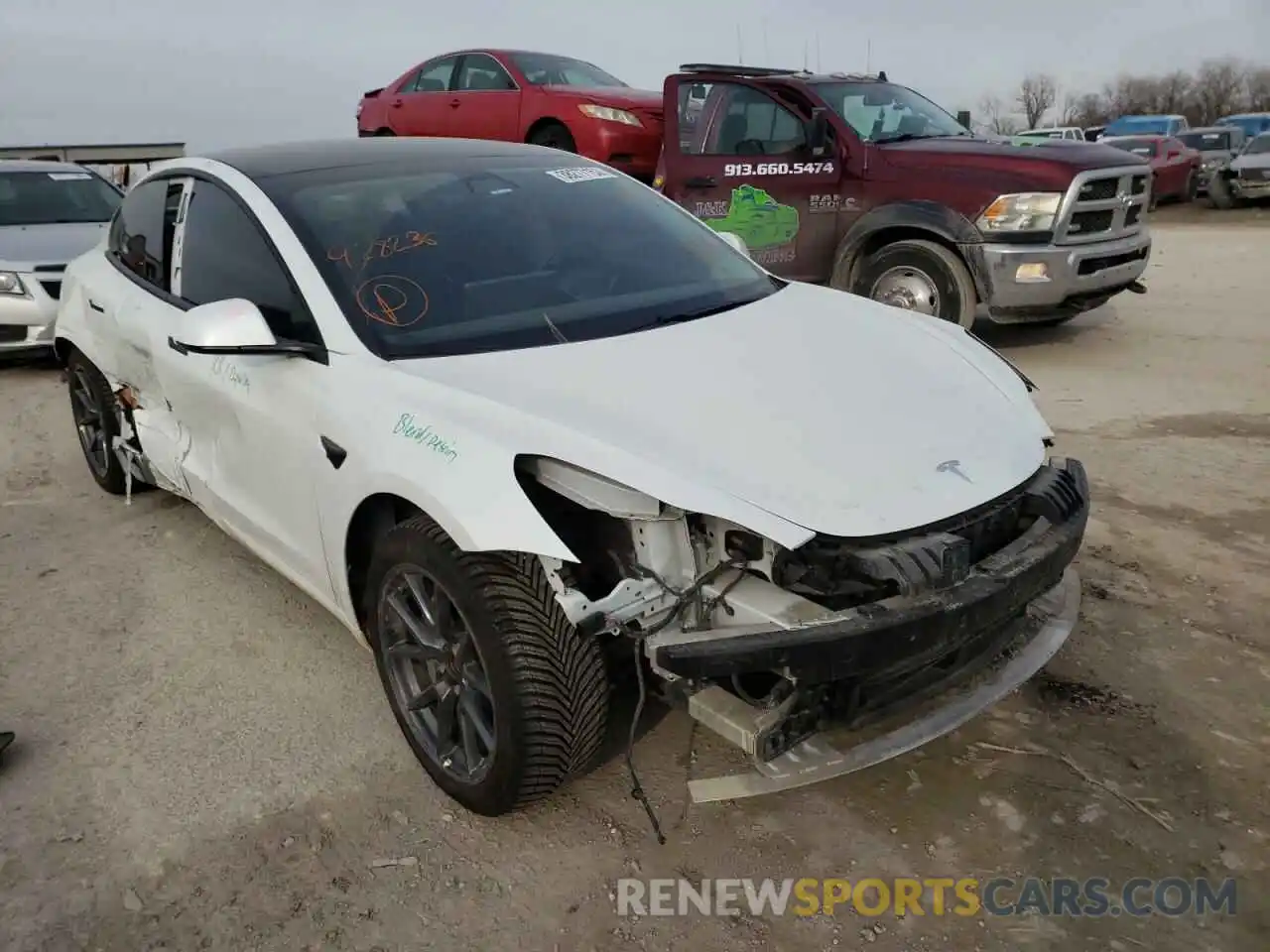 1 Photograph of a damaged car 5YJ3E1EB2MF928236 TESLA MODEL 3 2021