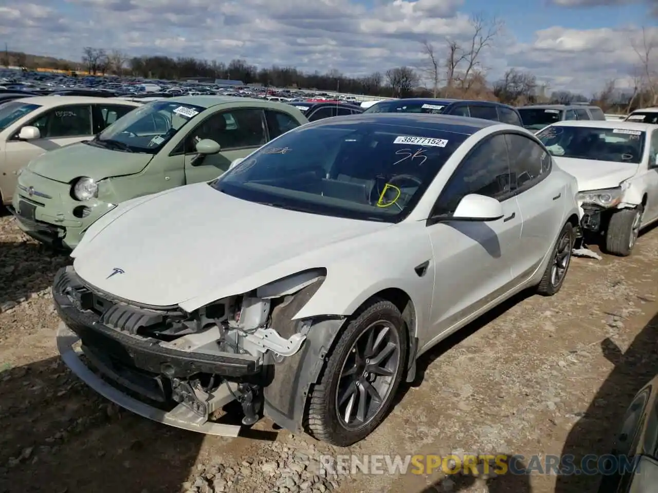 2 Photograph of a damaged car 5YJ3E1EB2MF928236 TESLA MODEL 3 2021