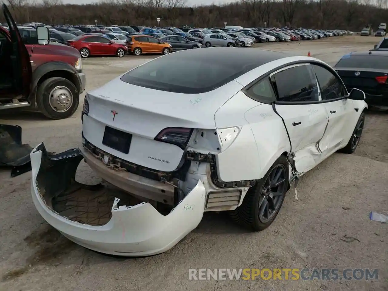 4 Photograph of a damaged car 5YJ3E1EB2MF928236 TESLA MODEL 3 2021