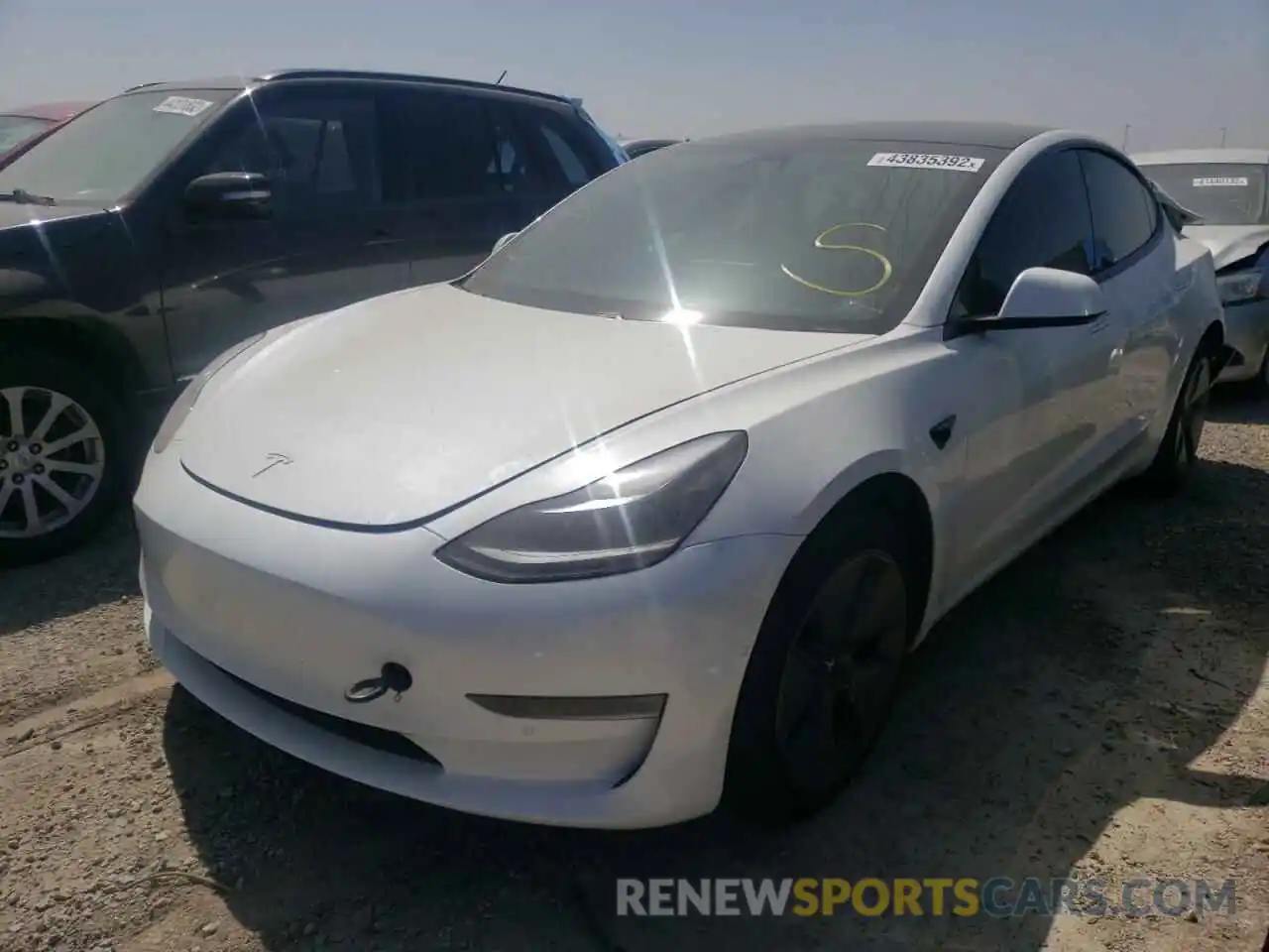 2 Photograph of a damaged car 5YJ3E1EB2MF938099 TESLA MODEL 3 2021