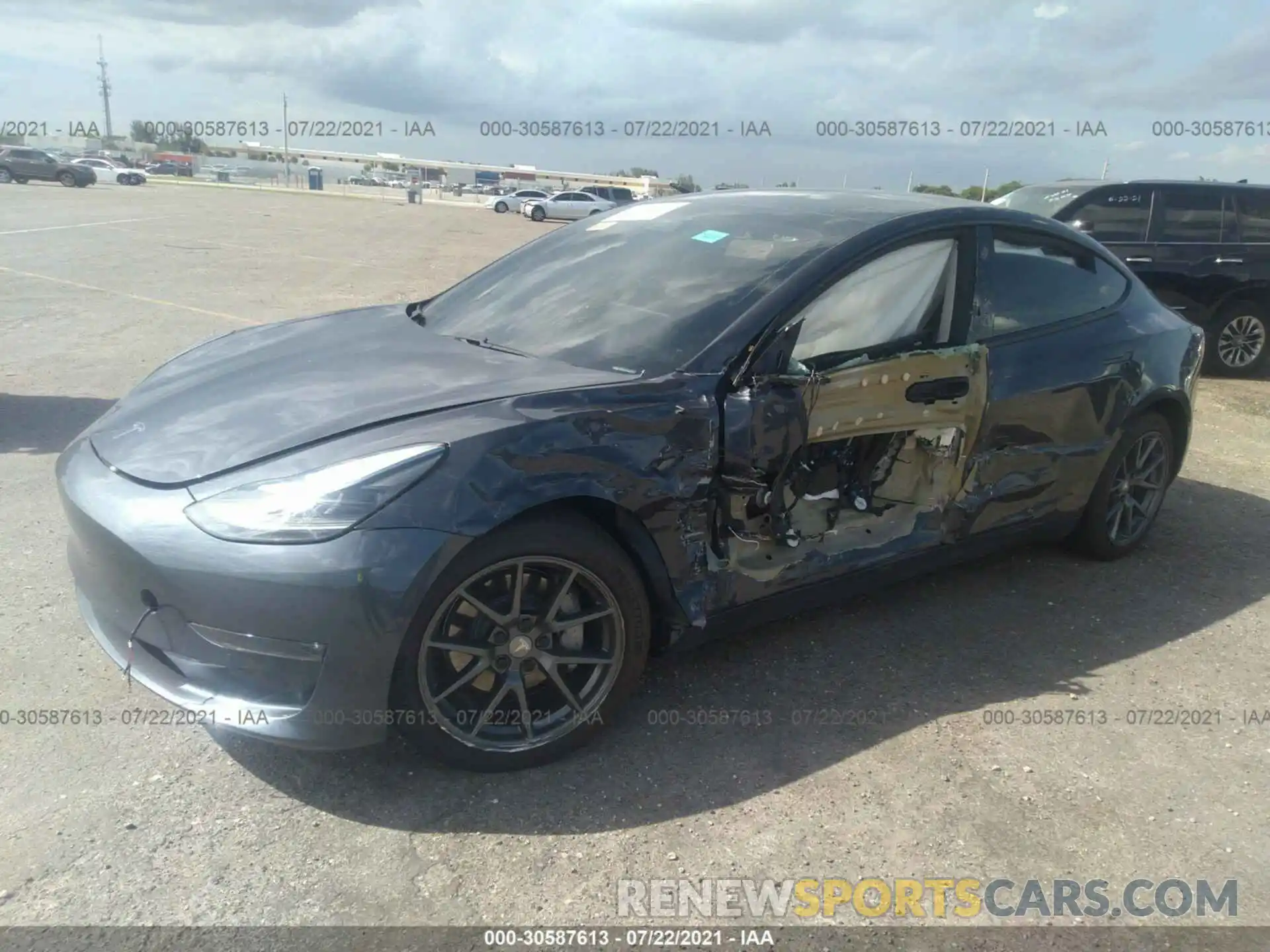 2 Photograph of a damaged car 5YJ3E1EB2MF965528 TESLA MODEL 3 2021