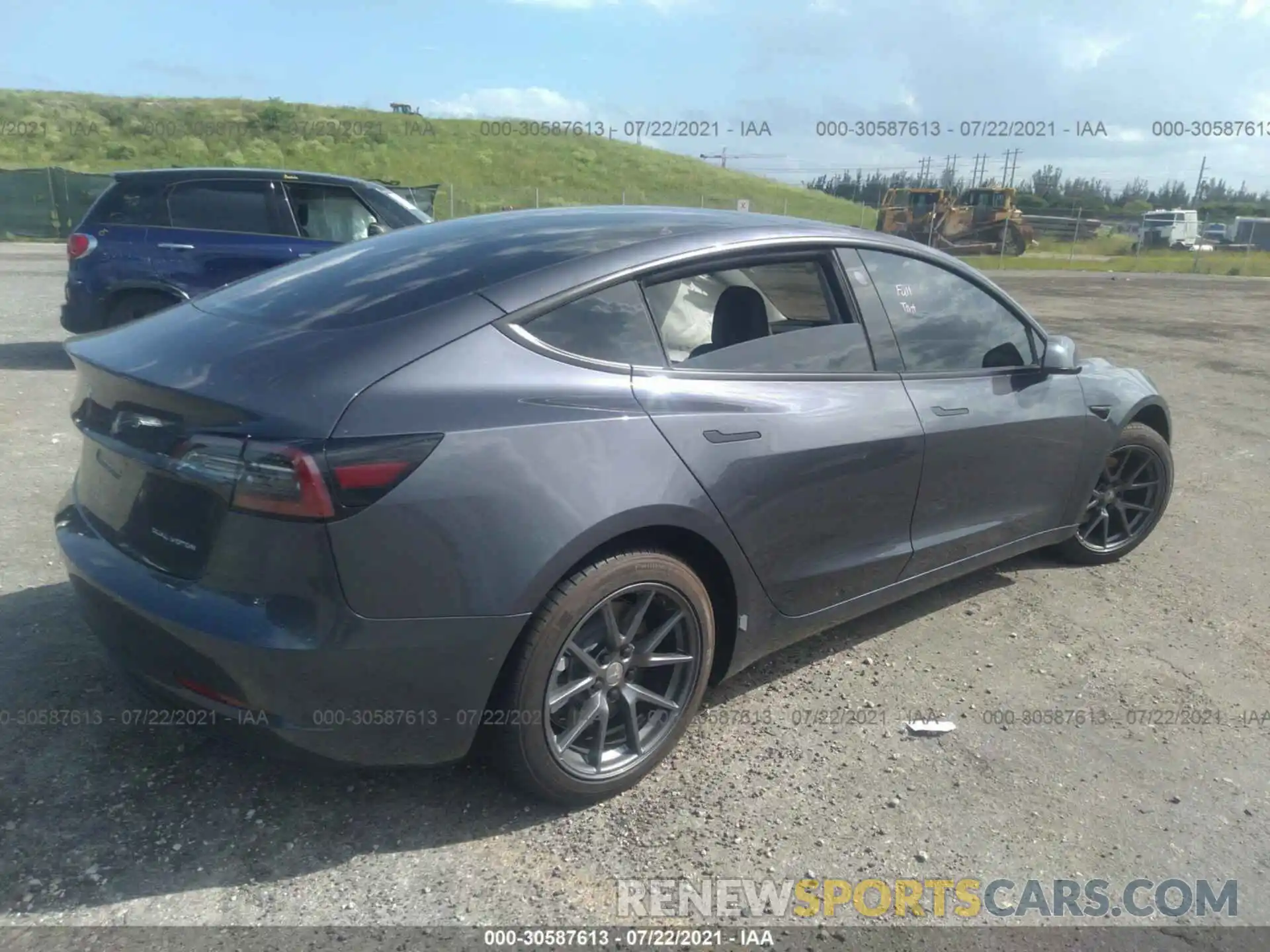 4 Photograph of a damaged car 5YJ3E1EB2MF965528 TESLA MODEL 3 2021