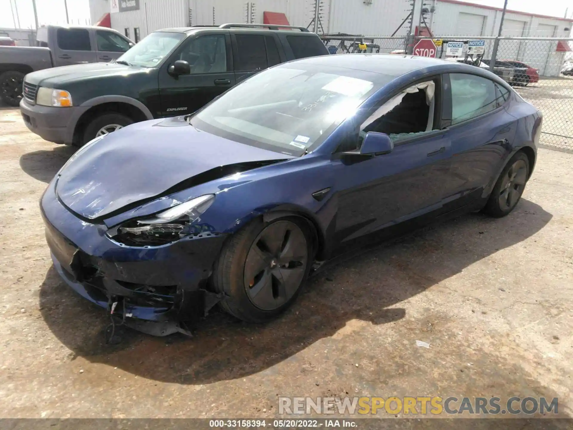 2 Photograph of a damaged car 5YJ3E1EB2MF974889 TESLA MODEL 3 2021