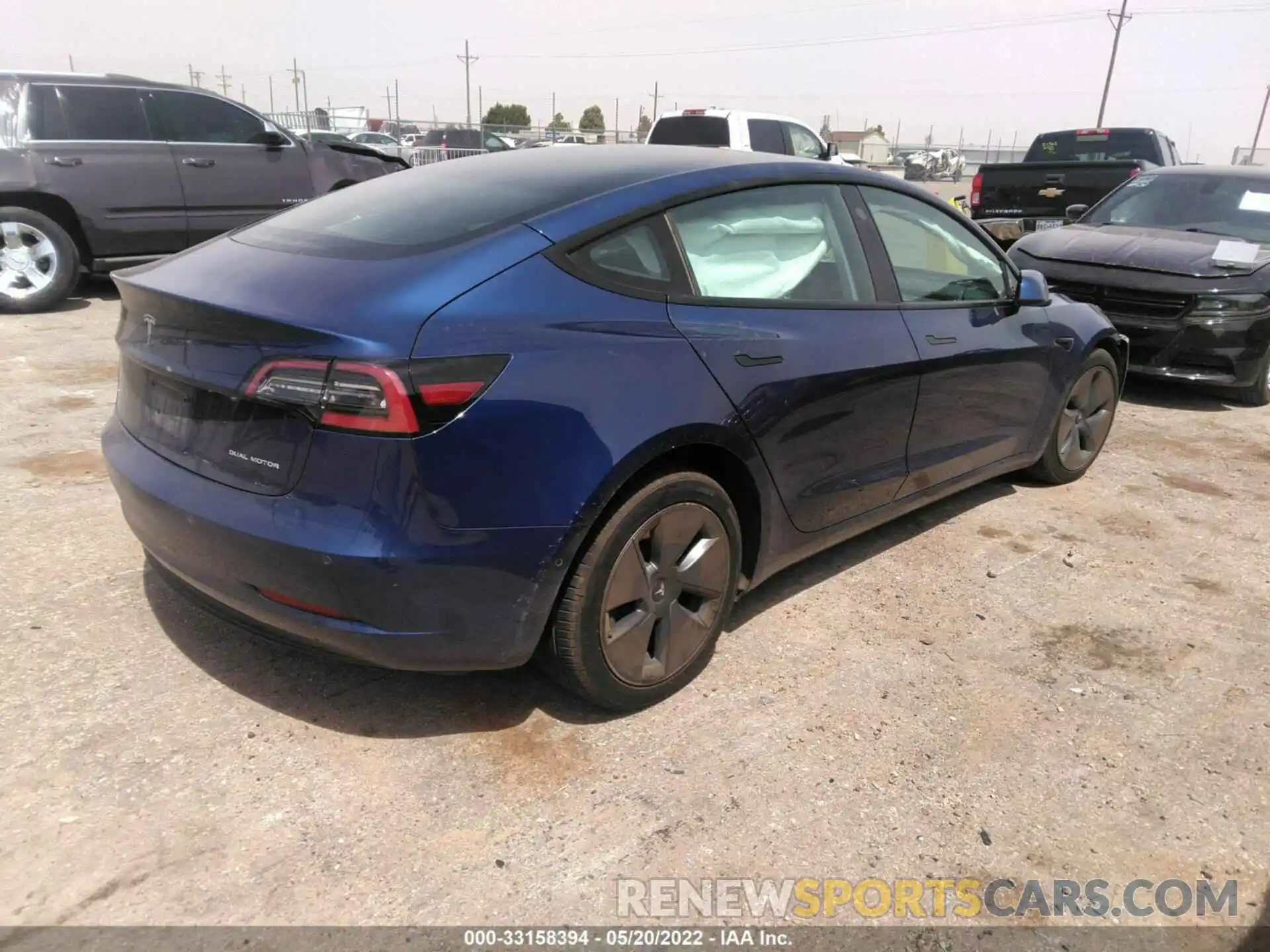 4 Photograph of a damaged car 5YJ3E1EB2MF974889 TESLA MODEL 3 2021