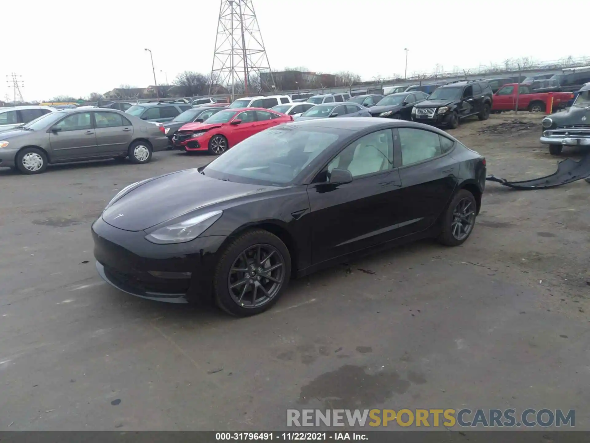 2 Photograph of a damaged car 5YJ3E1EB2MF975640 TESLA MODEL 3 2021