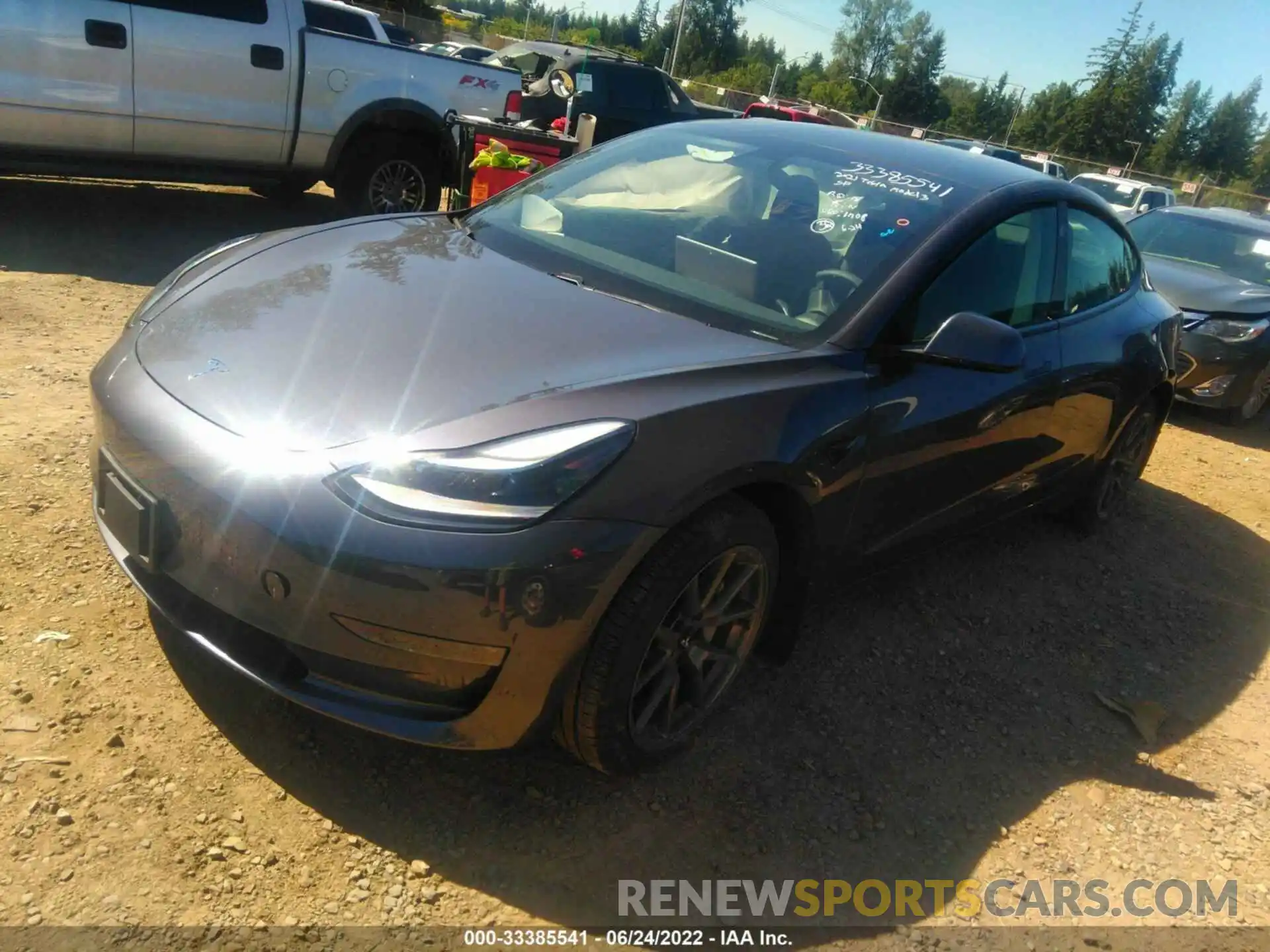 2 Photograph of a damaged car 5YJ3E1EB2MF978814 TESLA MODEL 3 2021