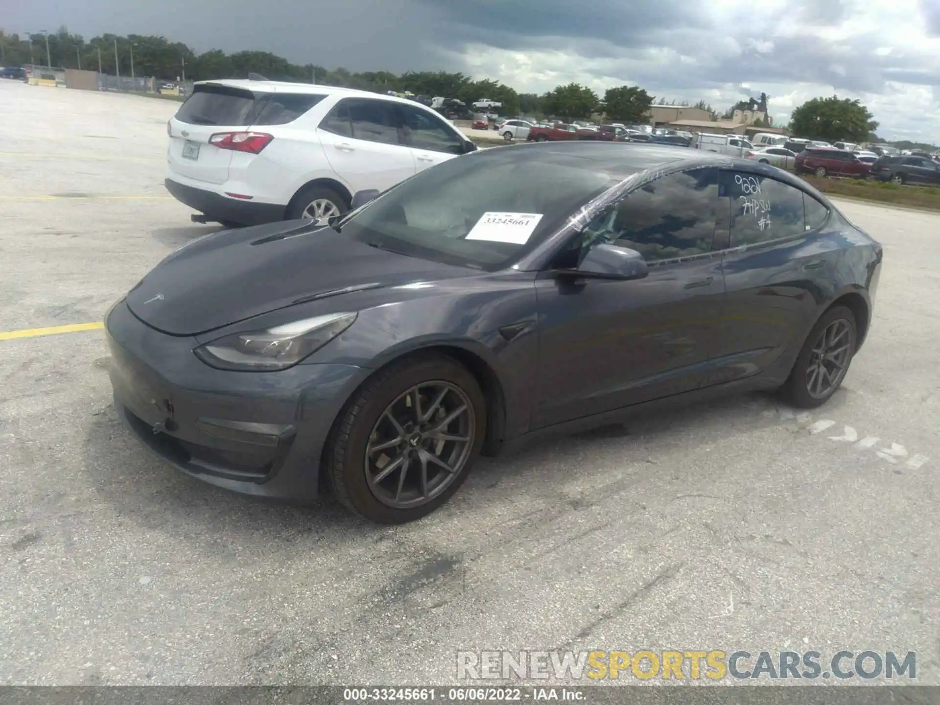 2 Photograph of a damaged car 5YJ3E1EB2MF979221 TESLA MODEL 3 2021