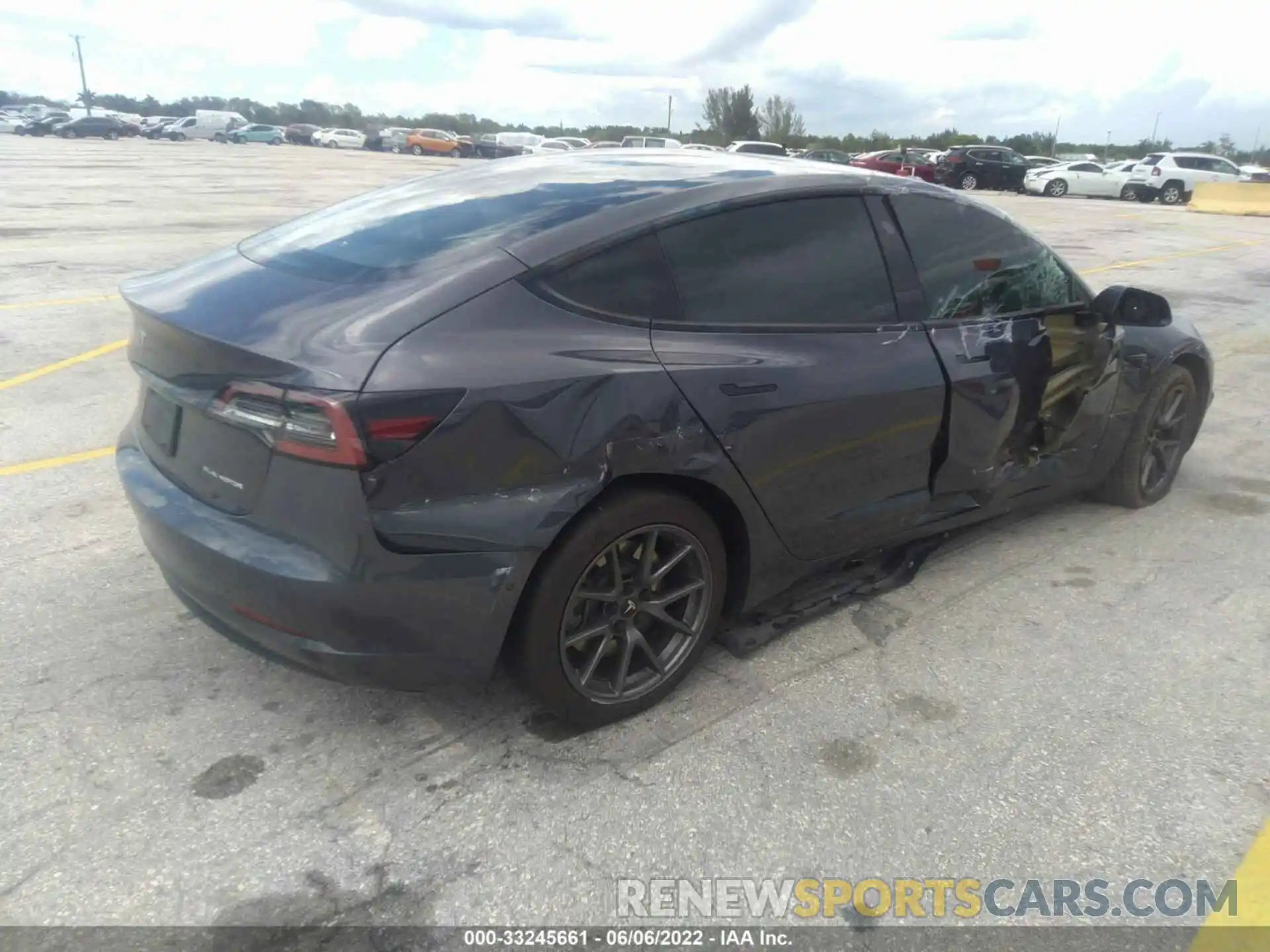 4 Photograph of a damaged car 5YJ3E1EB2MF979221 TESLA MODEL 3 2021