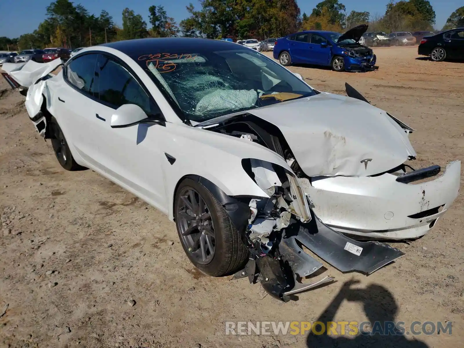 1 Photograph of a damaged car 5YJ3E1EB2MF993023 TESLA MODEL 3 2021